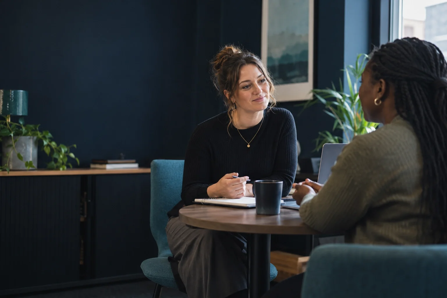 A Crown Talent consultant in a one-to-one meeting with a client